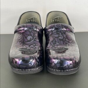 Dansko XP Iridescent Rainbow Black Tooled Floral Leather Stapled Slip-on Clogs